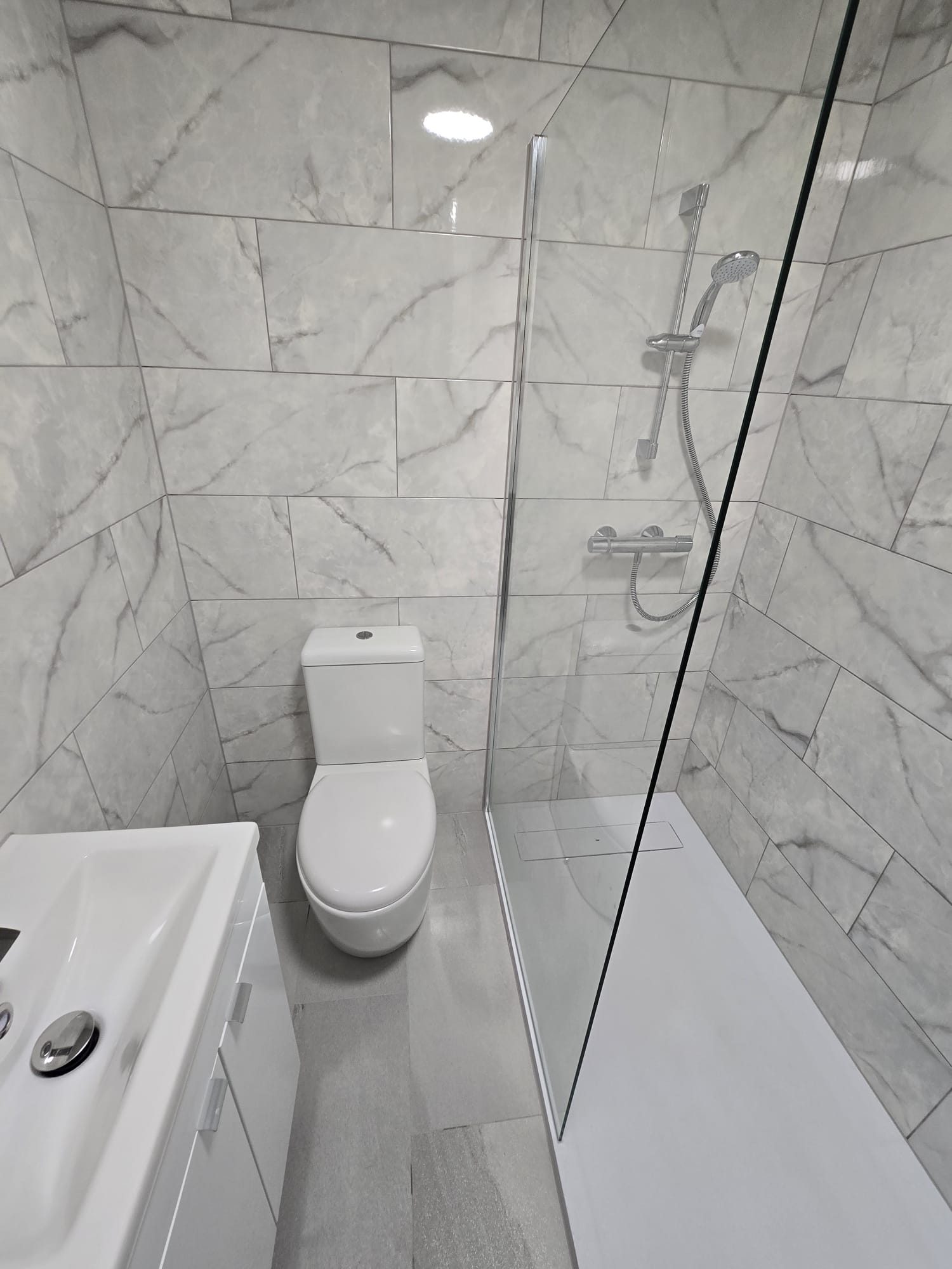 Completed bathroom refurbishment view 1