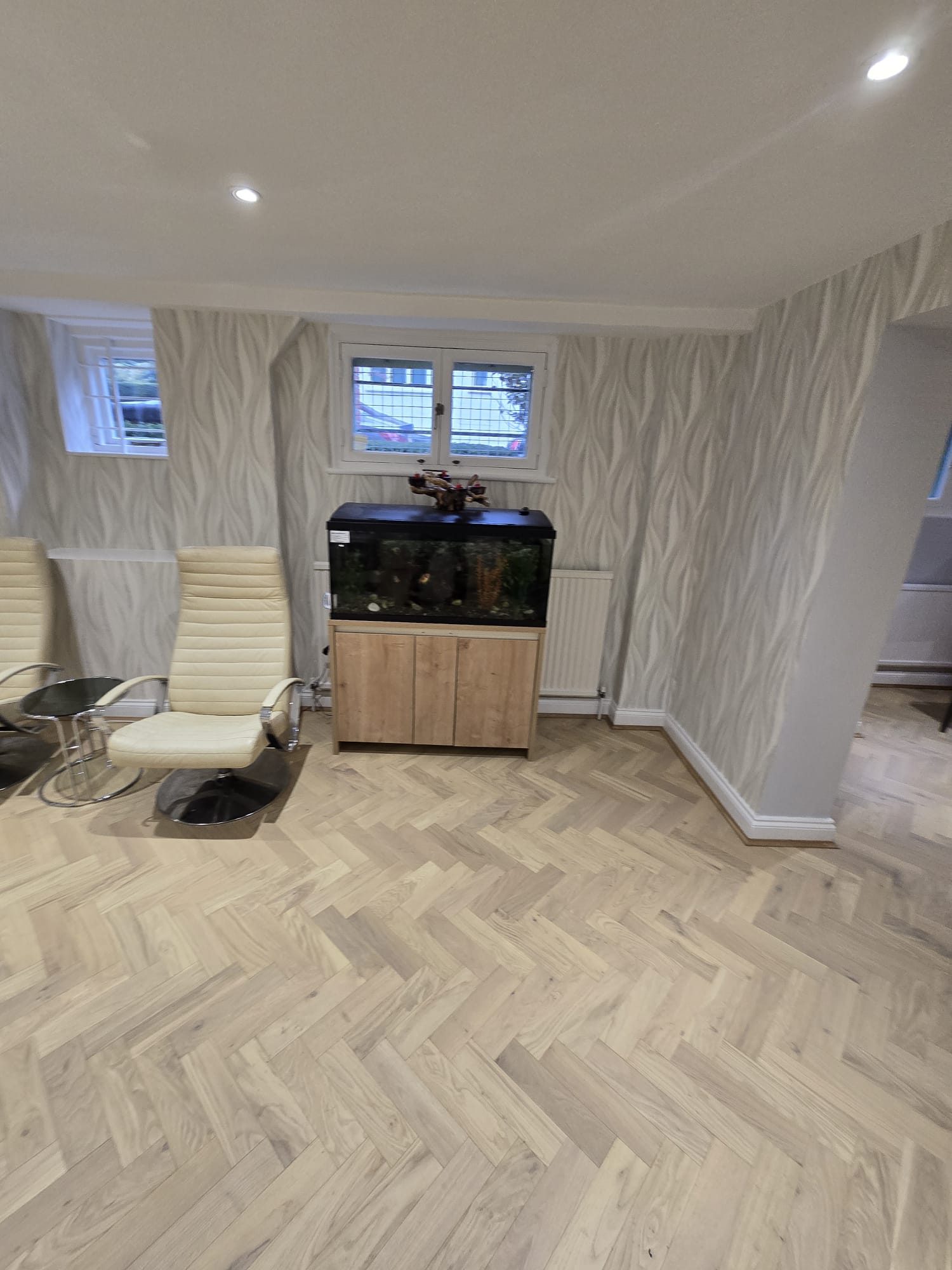 Finished herringbone flooring and wall finish