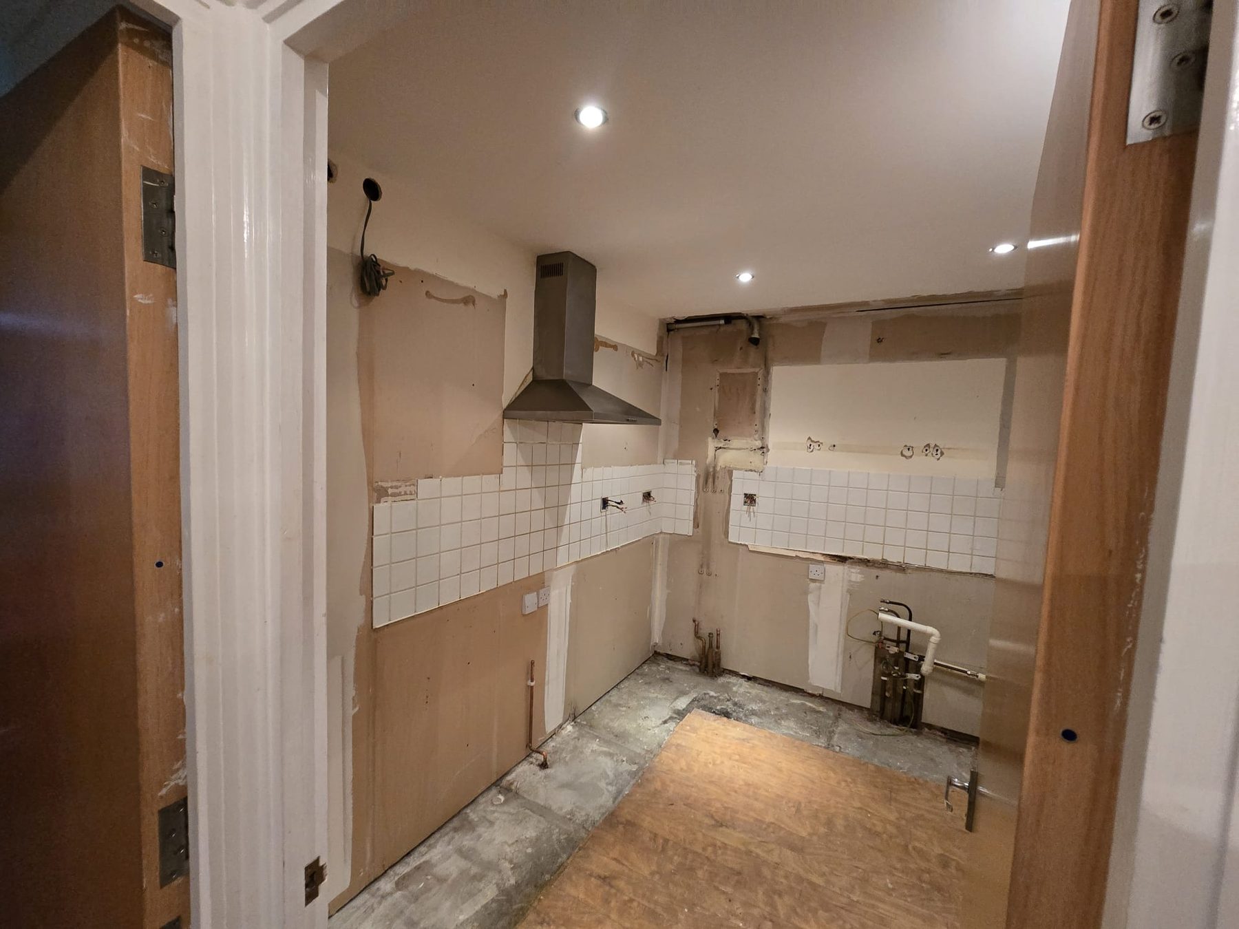 Kitchen before installation viewed from doorway