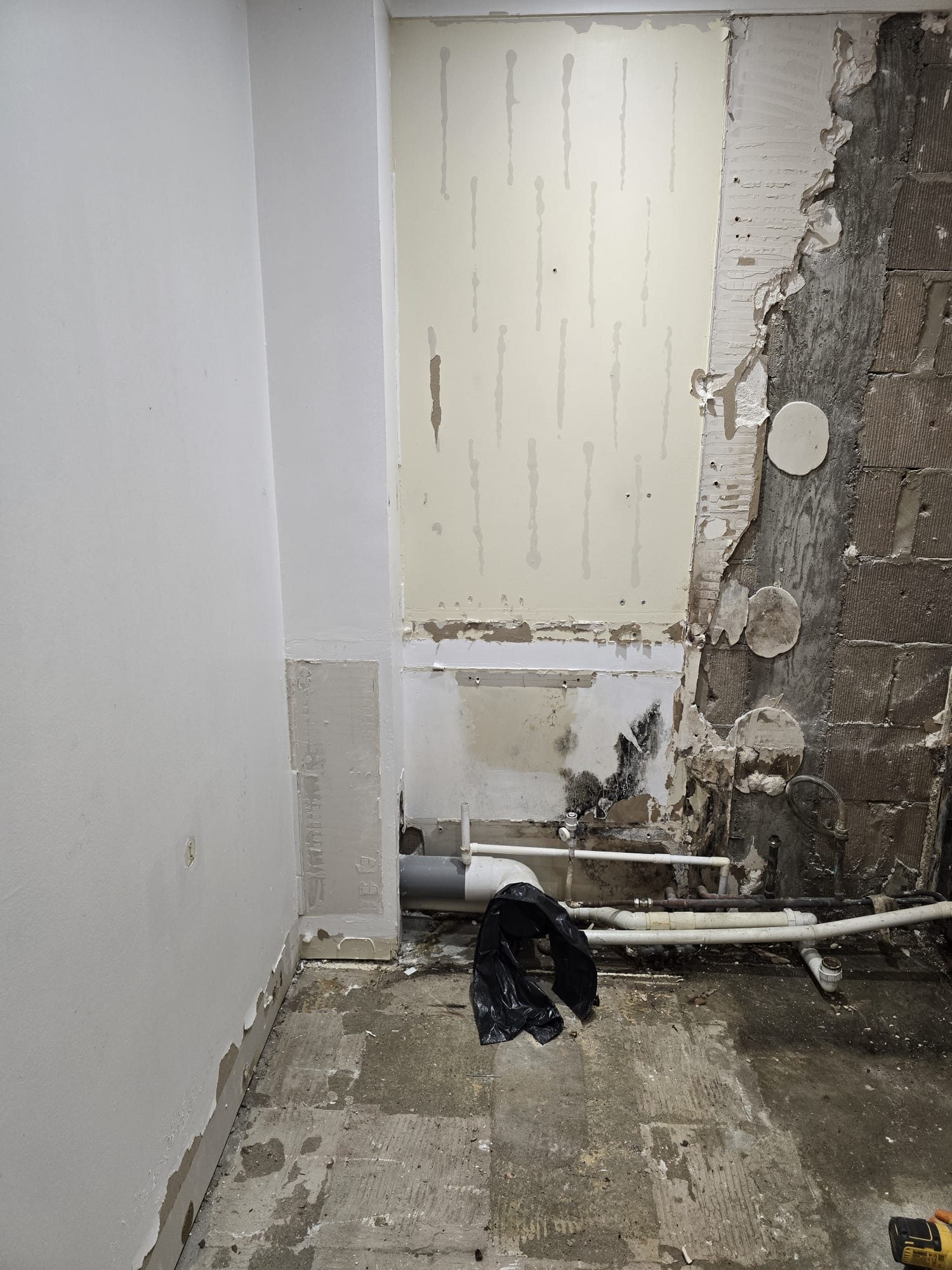 Bathroom stripped back before tiling