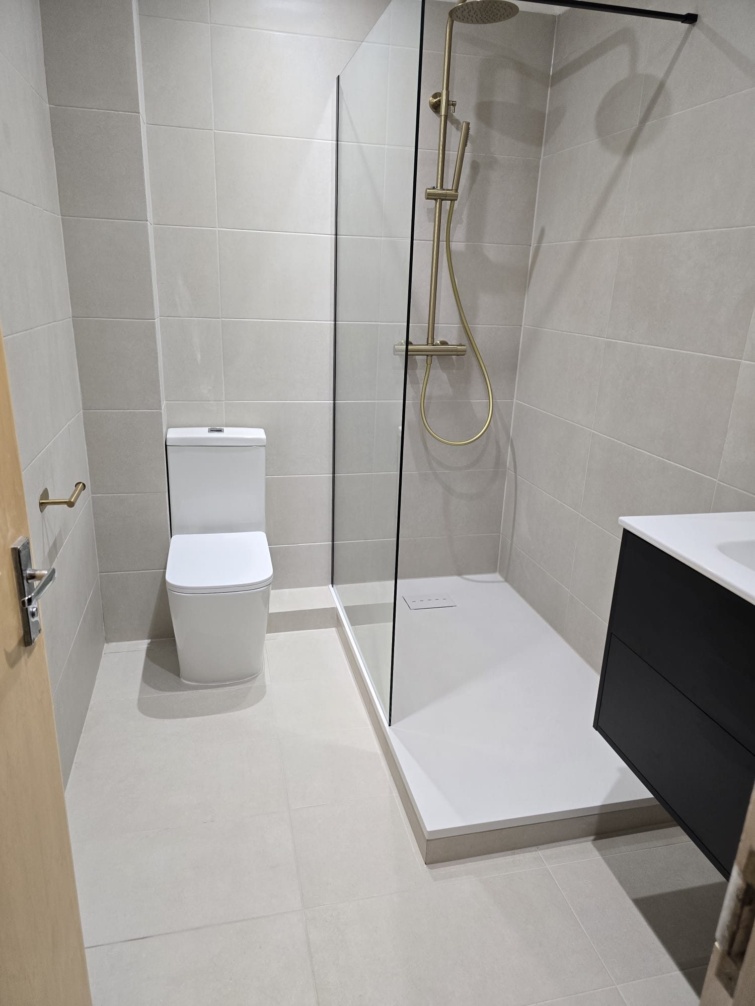 Completed bathroom with shower and toilet